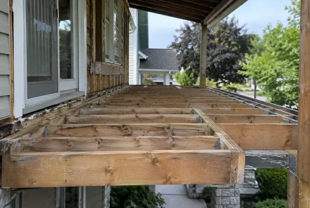 Exposed floor framing at exterior overhang
