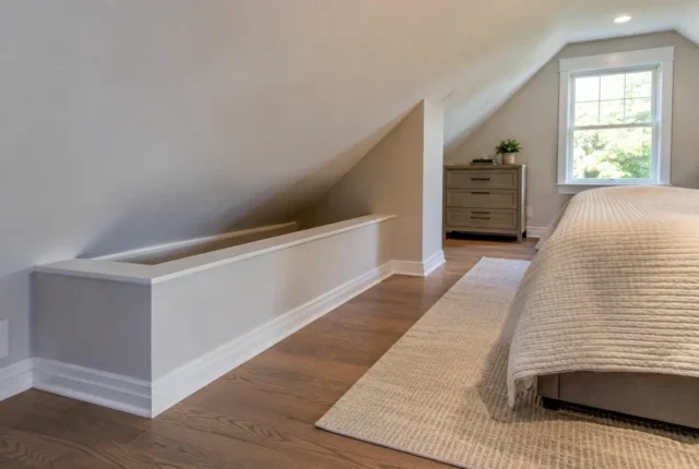 Finished upper-floor room beside side attic